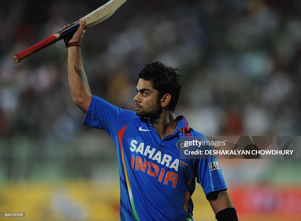 Indian cricketer Virat Kohli reacts as h