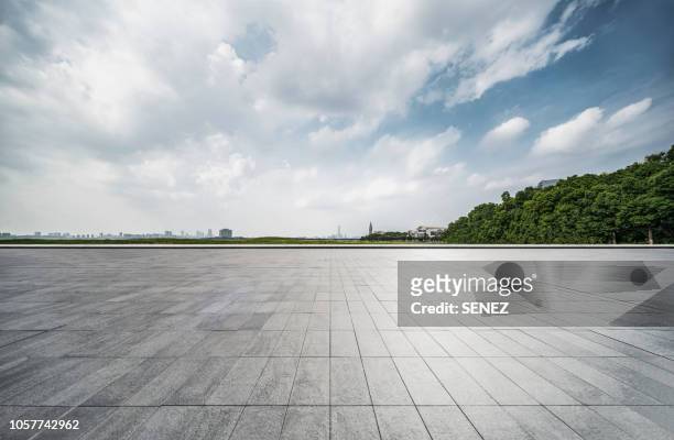 empty parking lot - asphalt paving stock pictures, royalty-free photos & images
