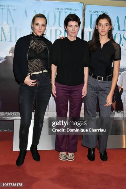 Jehnny Beth, Christine Angot and Estelle Lescure attend "Un Amour Impossible" Paris Premiere at UGC Cine Cite des Halles on November 5, 2018 in...