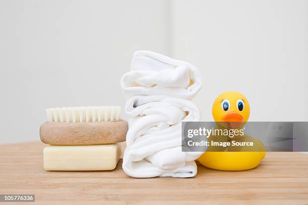 baby bathroom accessories - washcloth stock-fotos und bilder