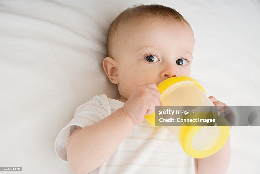 Baby drinking from bottle