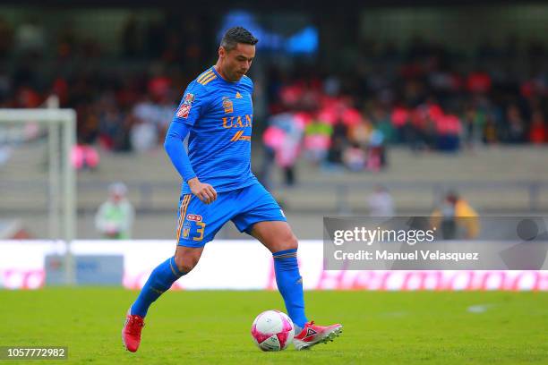 Juninho of Tigres controls the ball during the 13th round match between Pumas UNAM and Tigres UANL as part of the Torneo Apertura 2018 Liga MX at...