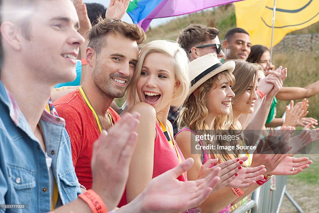 Young people cheering at festival