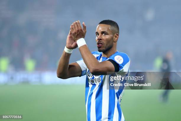 Mathias Zanka Jorgensen of Huddersfield Town shows appreciation to the fans following his sides victory in the Premier League match between...