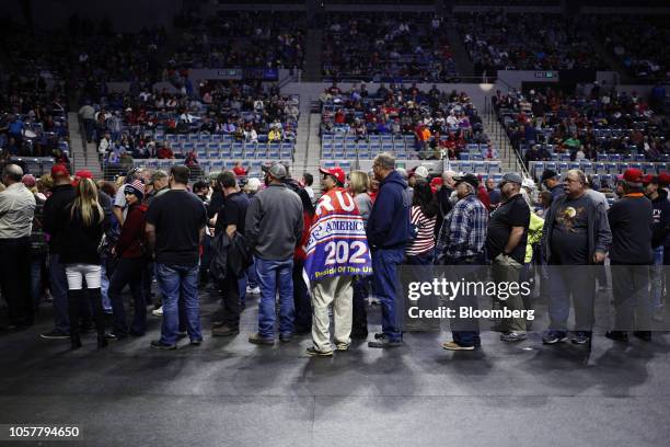 Attendees wait in line to buy campaign merchandise inside a campaign rally for Mike Braun, Republican U.S. Senate candidate from Indiana, featuring...