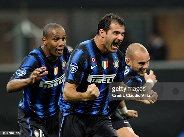 Dejan Stankovic, Maicon and Wesley Sneijder of FC Internazionale Milano celebrate the third goal during the UEFA Champions League group A match...