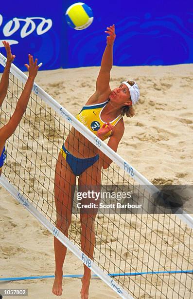 Kerri Pottharst of Australia spikes during the Womens Beach Volleyball Final at Bondi Beach on Day Ten of the Sydney 2000 Olympic Games in Sydney,...