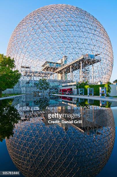 biosphere reflected in water - montréal stock-fotos und bilder