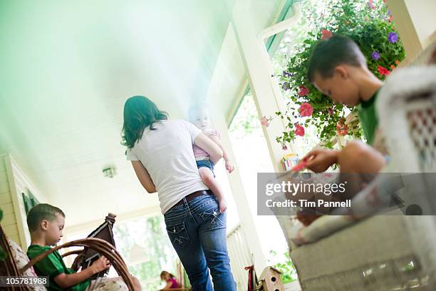 family on porch - back porch stockfoto's en -beelden