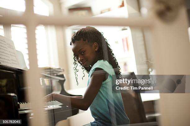 Black Kid Playing Piano Photos and Premium High Res Pictures - Getty Images