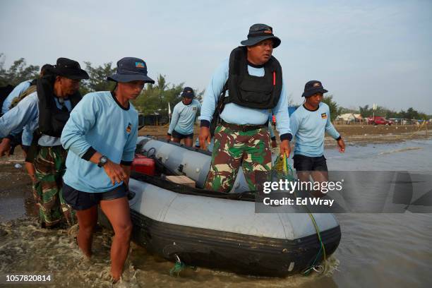 Navy divers prepare for day of searching the Lion Air flight 610 wreckage site on November 6, 2018 in Karawang, Indonesia. Indonesian officials said...