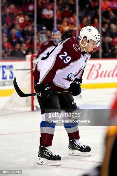 Colorado Avalanche Center Nathan MacKinnon prepares for a face-off during the second period of an NHL game where the Calgary Flames hosted the...
