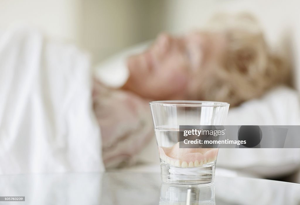 Dentures in a glass of water