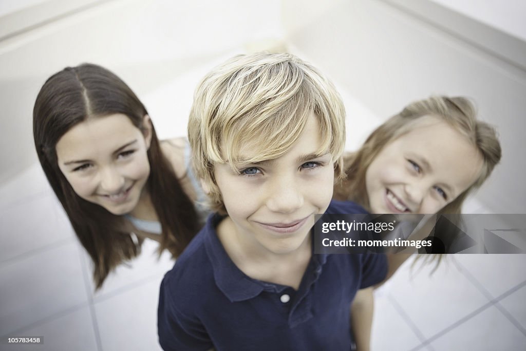 Three playful children