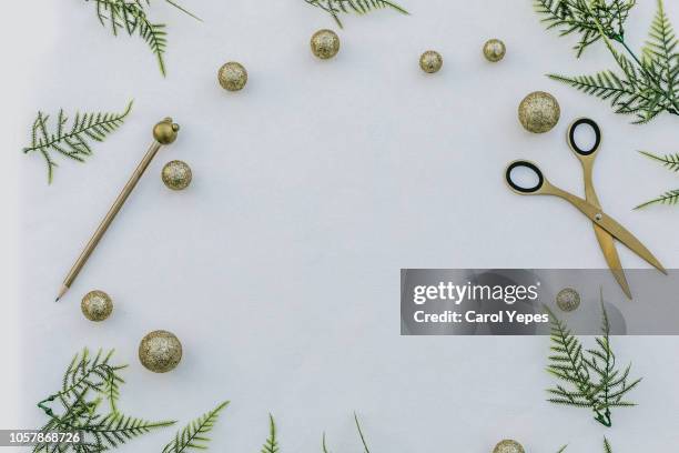 christmas frame with pinecone ,fir branches, scissors,pen - christmas brunch stock-fotos und bilder