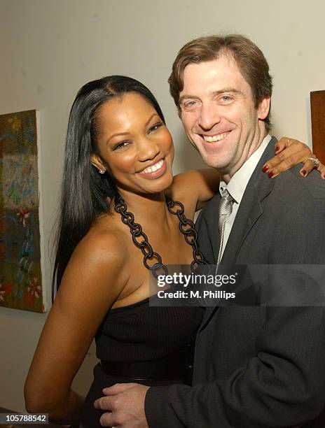 Garcelle Beauvais and husband Mike Nilon during Hunt Slonem Art Exhibit - Celebrity Dinner at Don O'Melveny Gallery in Los Angeles, California,...