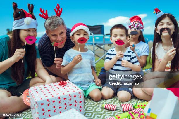 lets make faces. - new zealand christmas stock pictures, royalty-free photos & images