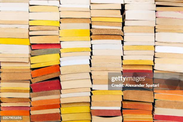 stacks of books on the shelf - books collection stock-fotos und bilder