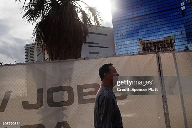 Man walks by a halted construction project on Las Vegas Boulevard on October 20, 2010 in Las Vegas, Nevada. Nevada once had among the lowest...