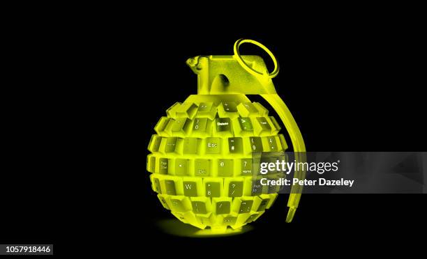 solarized yellow grenade made from computer keyboard - hand grenade stock pictures, royalty-free photos & images