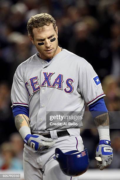 Josh Hamilton of the Texas Rangers reacts after striking out against the New York Yankees in Game Five of the ALCS during the 2010 MLB Playoffs at...