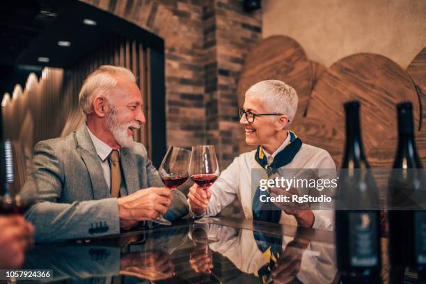 older couple drinking wine - drunk husband stock pictures, royalty-free photos & images