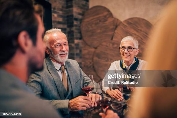 man drinking wine with family - drunk husband stock pictures, royalty-free photos & images