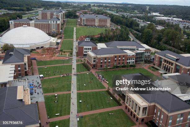 Students mingle on the campus lawn at Liberty University on October 20, 2018 in Lynchburg, Virginia. Liberty University is one of America's premiere...