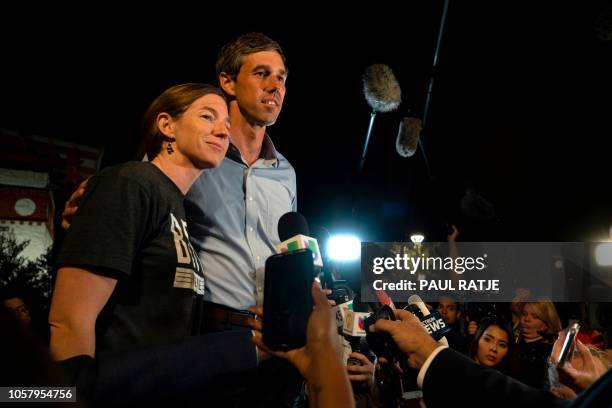Texas Representative and Senatorial Democratic Party Candidate Beto O'Rourke greets the press with his wife, Amy Hoover Sanders , outside of Magoffin...