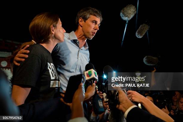 Texas Representative and Senatorial Democratic Party Candidate Beto O'Rourke greets the press with his wife, Amy Hoover Sanders , outside of Magoffin...