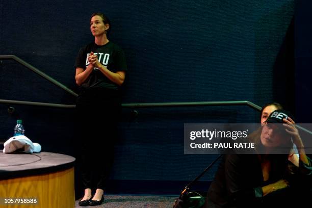 Amy Hoover Sanders , the wife of Texas Representative and Senatorial Democratic Party Candidate Beto O'Rourke, listens to his speech at the...