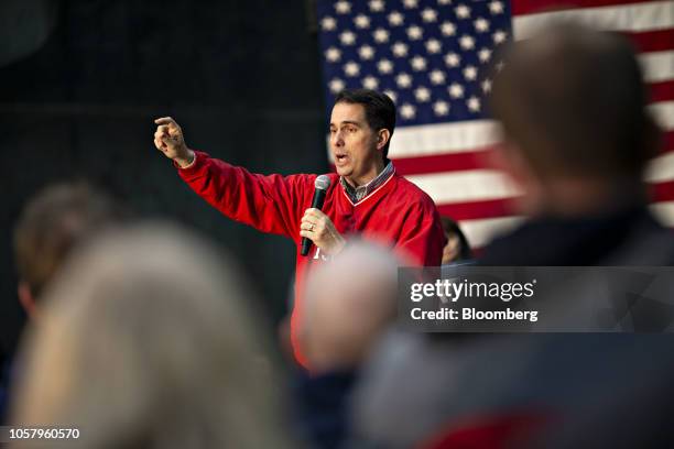 Scott Walker, governor of Wisconsin, speaks during a campaign rally at Weldall Manufacturing Inc., in Waukesha, Wisconsin, U.S., on Monday, Nov. 5,...