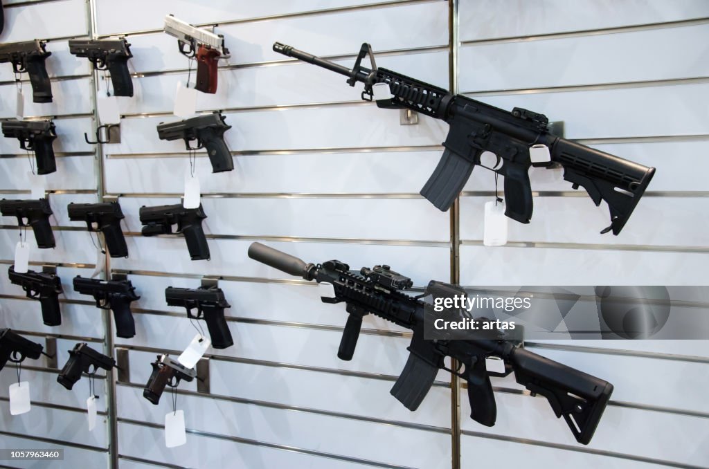Gun Wall Rack Background Gun Wall Rack With Rifles And Pistol High-Res Stock Photo - Getty Images