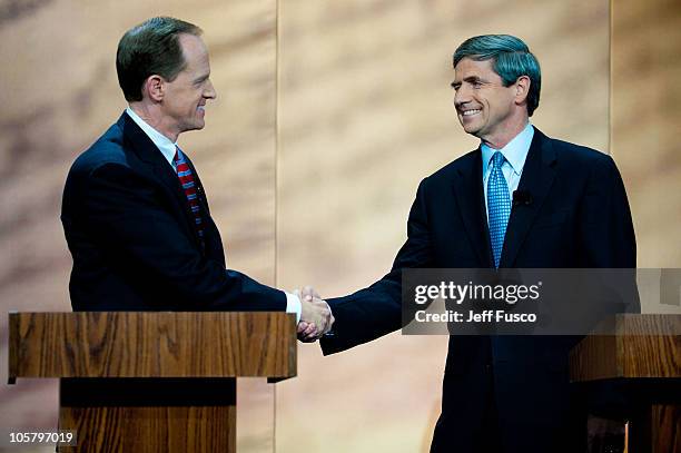Senate Republican candidate Pat Toomey and U.S. Senate Democratic candidate Congressman Joe Sestak shake hands prior to their debate at the National...