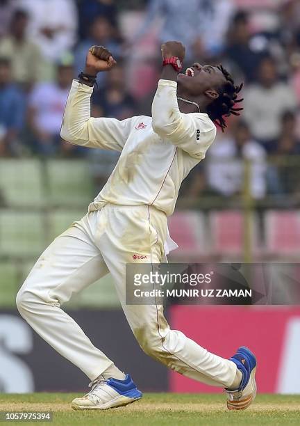 Zimbabwe cricketer Brandon Mavuta celebrates after the dismissal of the Bangladesh cricketer Nazmul Islam during the fourth day of the first Test...