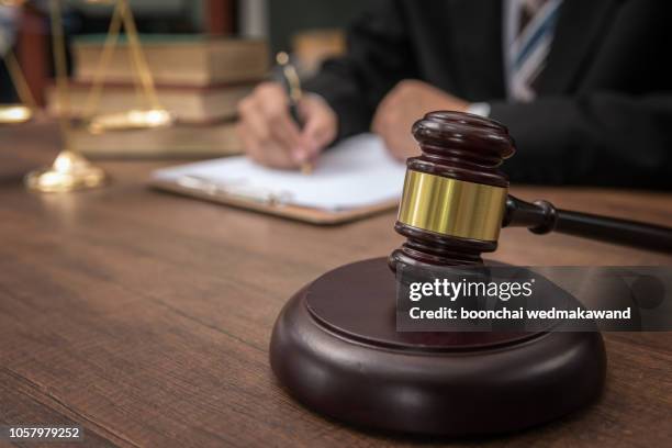 judge gavel with justice lawyers, businesswoman in suit or lawyer, advice and legal services concept. - gerechtsgebouw stockfoto's en -beelden