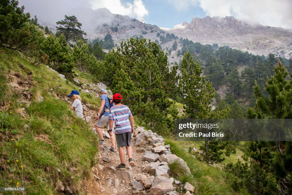 Family hiking on mount Olympus, Greece