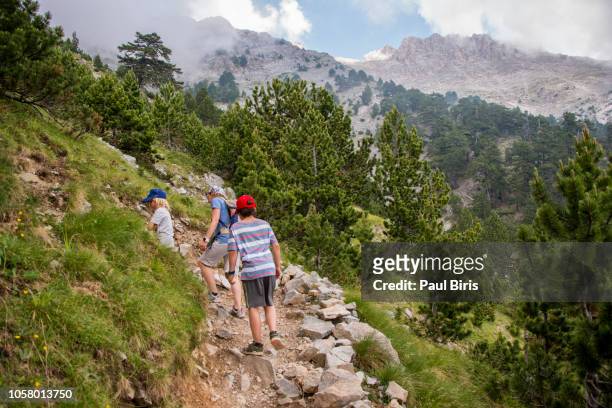 family hiking on mount olympus, greece - mount olympus stock pictures, royalty-free photos & images