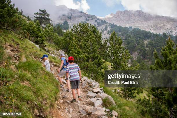 family hiking on mount olympus, greece - mount olympus greece imagens e fotografias de stock