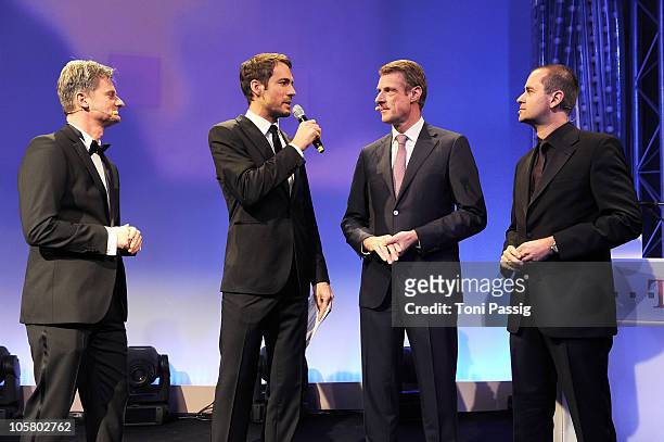 President of Microsoft Deutschland Ralph Haupter, Alexander Mazza, President Deutsche Telekom Nick van Damme and Michael Schult speak on stage during...