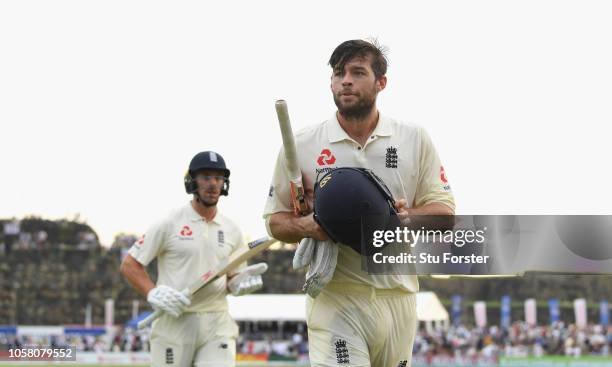 England batsman Ben Foakes leaves the field unbeaten on 87 runs on his debut with Jack Leach after Day One of the First Test match between Sri Lanka...