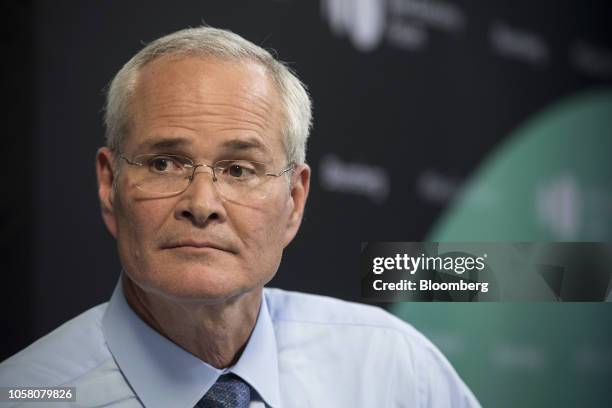 Darren Woods, chairman and chief executive officer of Exxon Mobil Corp., listens during a Bloomberg Television interview on the sidelines of the...