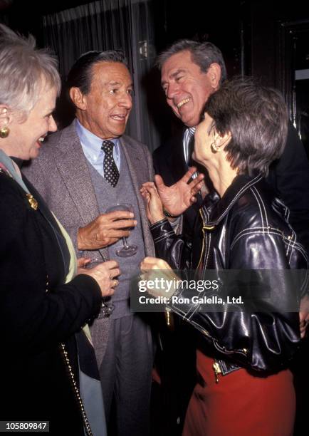 Mike Wallace, Dan Rather, and their wives during Party Celebrating Liz Smith's Interview In Playboy Magazine at Mortimer's in New York City, New...