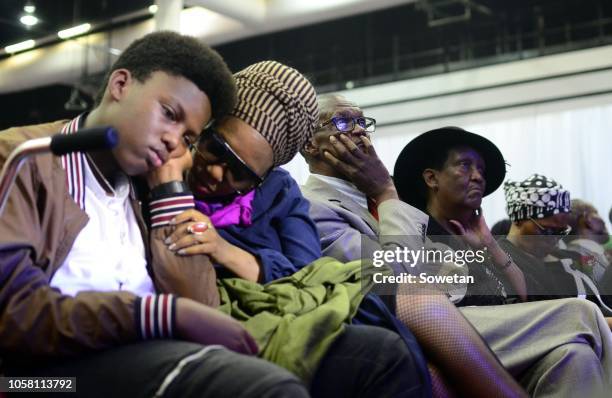 Family members mourn during the funeral service of the late musician Jabulani 'HHP' Tsambo at Mmabatho Convention Centre on November 03, 2018 in...