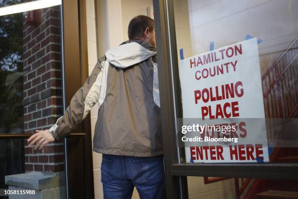 Voter enters a polling station in Carmel, Indiana, U.S., on Tuesday, Nov. 6, 2018. Today's midterm elections will determine whether Republicans keep...