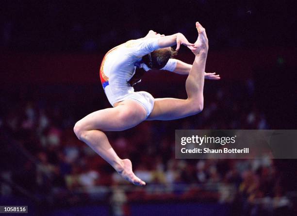 Andreea Raducan of Romania in action during the Womens Gymnastics Floor Exercise Final at the Sydney Superdome on Day Ten of the Sydney 2000 Olympic...