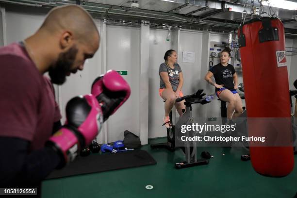 Members of the HMS Queen Elizabeth boxing club take part in a training session as she sails towards New York on October 19, 2018 in New York City....