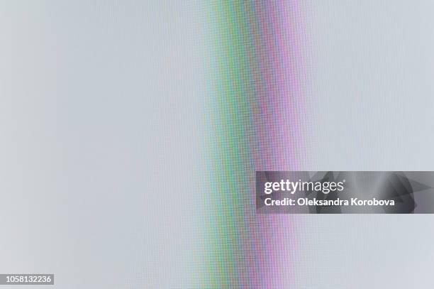 close-up of a colorful moire pattern on a computer screen. - moire stock pictures, royalty-free photos & images