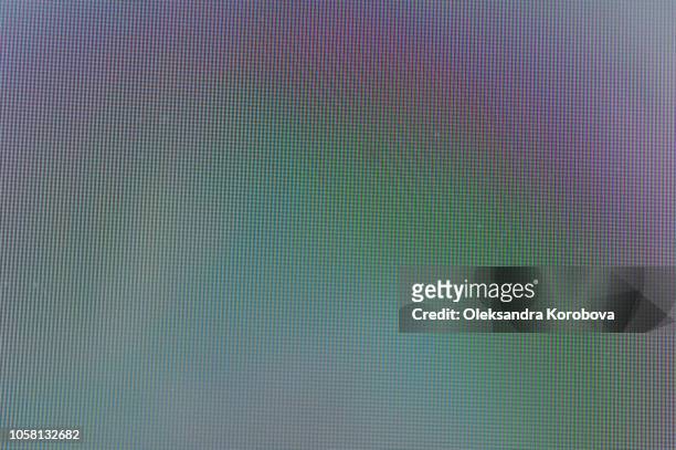 close-up of a colorful moire pattern on a computer screen. - moiré - fotografias e filmes do acervo