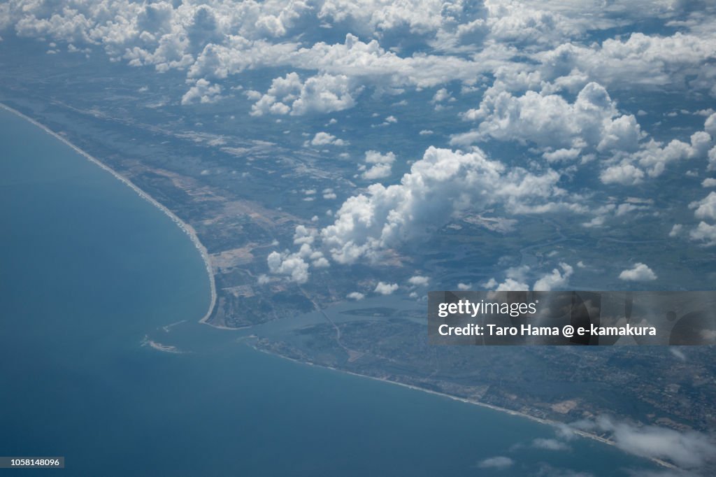 South China Sea and Hoi An in Quang Nam province in Vietnam daytime aerial view from airplane